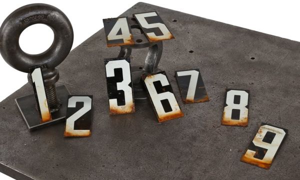 small lot of original c. 1930's american industrial baked black and white enameled folded steel "unitype" address numbers 