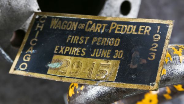 nicely aged and all original c. 1923 american industrial single-sided city of chicago cart or wagon peddler stamped brass metal license plaque or badge