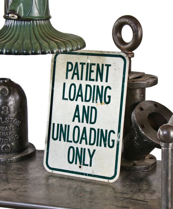 original single-sided heavy gauge steel vintage american michael reese hospital patient pick up and drop off post sign with green lettering