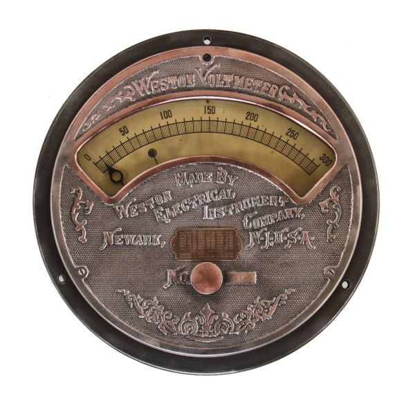 remarkably intact and highly sought after c. 1900-15 original american industrial weston ornamental cast iron analog volt meter with a partially intact copper-plated finish 
