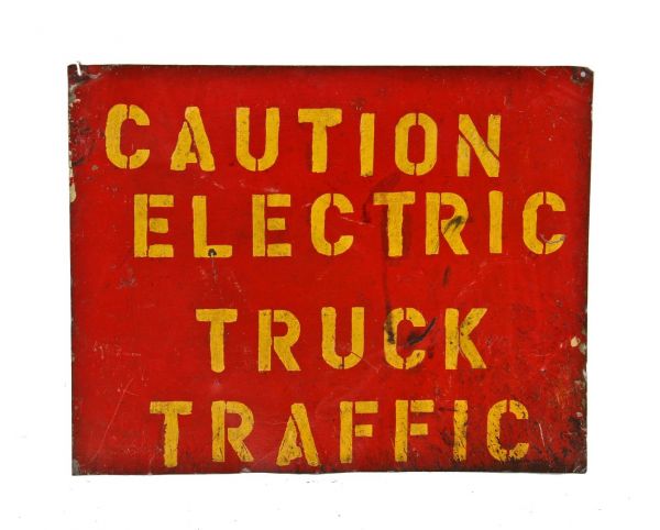 original brightly colored c. 1940's single-sided die cut steel "electric truck traffic" painted factory sign with stenciled lettering