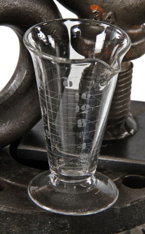 single diminutve early 20th century antique american pharmacy or research laboratory pressed clear soda lime glass conical-shaped measure with lightly etched markings