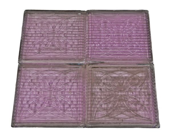 four matching all original late 19th or early 20th century frank lloyd wright-designed purple hue luxfer prism glass exterior building transom tiles