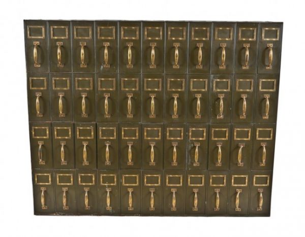 original and well-maintained c. 1915-20 american industrial cook county hospital olive green enameled all-metal compartmentalized freestanding filing cabinet with 44 drawers	