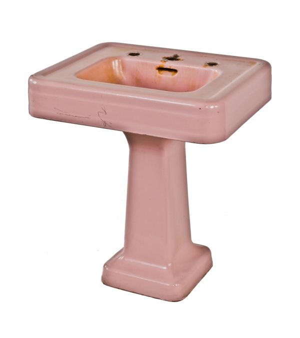 original and highly sought-after late 1930's american art deco streamlined style pink porcelain or vitreous enameled cast iron interior residential lavatory sink with pedestal base