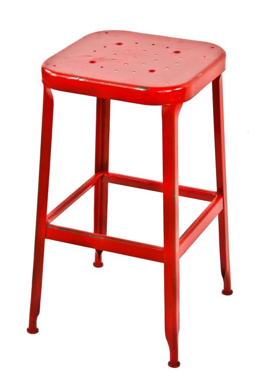 c. 1950's vintage american industrial red painted pressed and folded steel stationary factory machinist backless stool with a largely intact red paint finish 