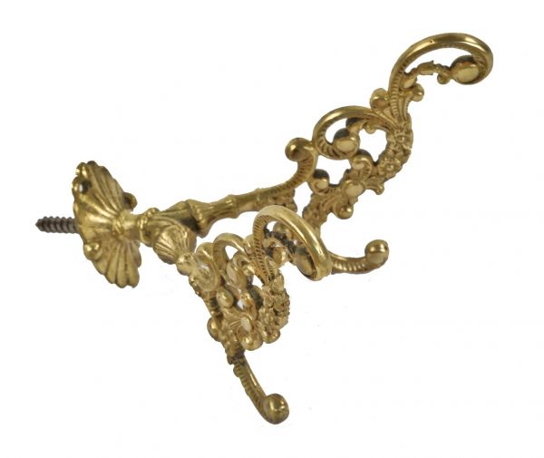 intricate and elegant all original oversized c. late 19th century ornamental cast yellow brass single interior residential hall tree or pier mirror coat hook with uniform finish 