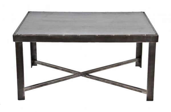 original and intact reconfigured c. 1940's vintage american industrial all-welded joint heavy gauge four-legged steel low-lying coffee table with a sealed bare metal finish 