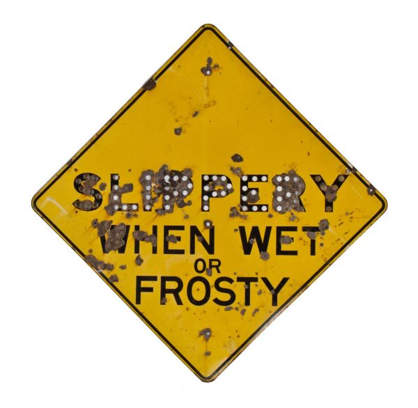 unique oversized c. 1940's vintage american industrial single-sided heavy gauge stamped steel diamond-shaped "slippery when wet cautionary road sign with bright yellow paint finish 