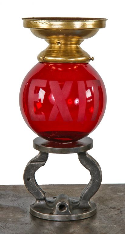 single c. 1930's american depression era chicago commercial building interior hallway ruby red glass exit light fixture with lightly etched lettering