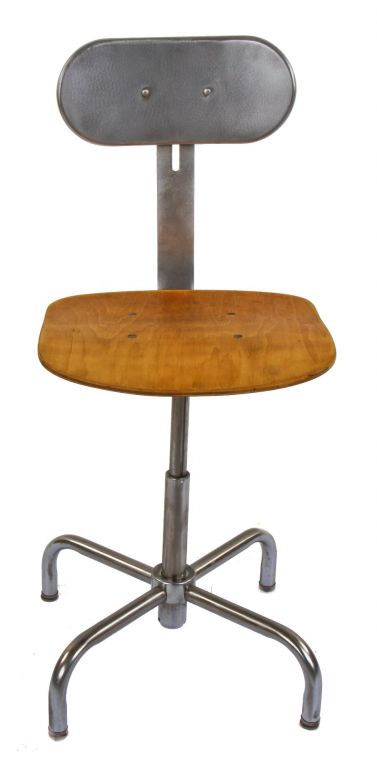 original adjustable height vintage american industrial four-legged tubular steel stationary factory workbench stool with original maple wood seat