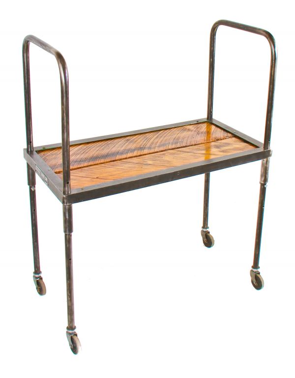 repurposed c. 1950's vintage industrial single tier mobile "bishop clothes cart" with old growth sawn pine wood inset or shelf