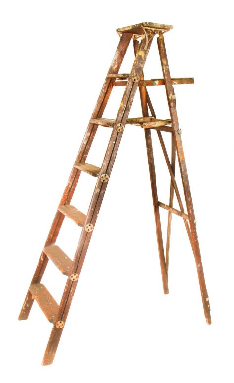 original nicely worn early 20th century american antique industrial oak wood folding ladder with patented opposed cast iron rung or step thru bolt discs