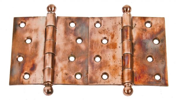pair of original matching heavily plated copper loose pine antique american unornamented cast iron passage door hinges with intact ball finials