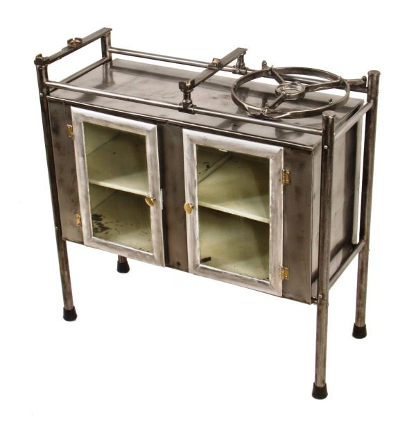 original and largely intact c. 1917-20 american medical freestanding hospital operating room workstation with encased cabinet for the storage of dressings