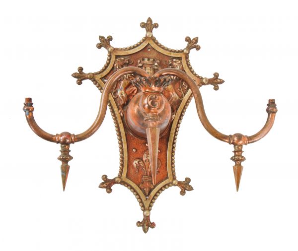 all original and historically important ornamental cast bronze and brass interior double arm columbus memorial building wall sconce