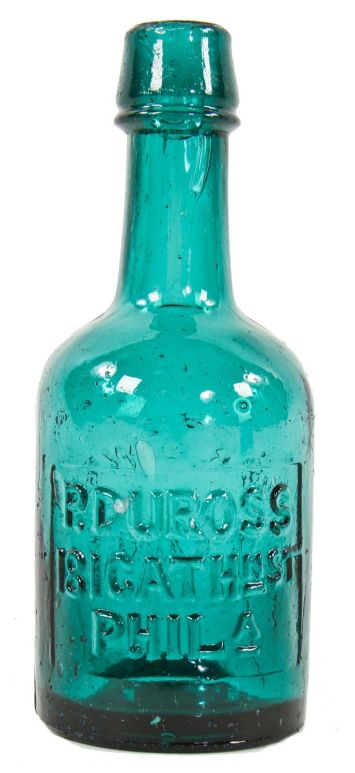 original c. 1855-65 brilliantly colored emerald green p. duross "brown stout" squat bottle with distinctive crudity and applied slopping collar with single ring