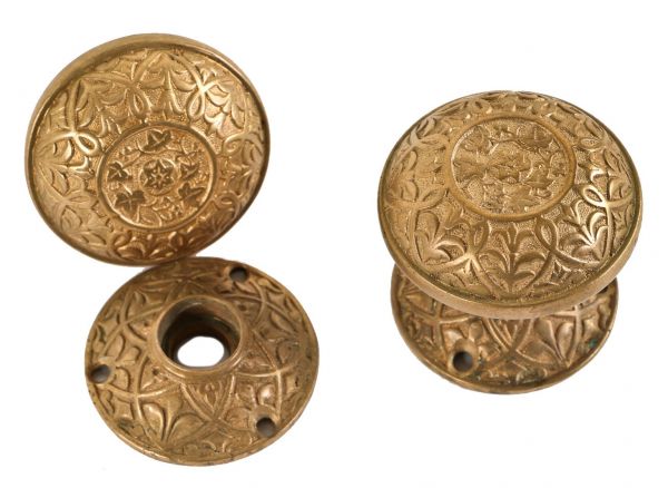 complete set of original 19th century american victorian era ornamental cast bronze banded rim doorknobs with matching circular-shaped rosettes 