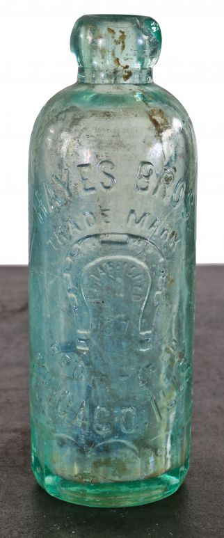 hard to find original privy dug late nineteenth century light aqua hutchinson style soda bottle with mug base manufactured for the hayes brothers in chicago, illinois.