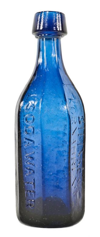 rare and intact mid-nineteenth century deep cobalt blue eight-sided soda water bottle manufactured for charleston bottlers steinke & kornharens