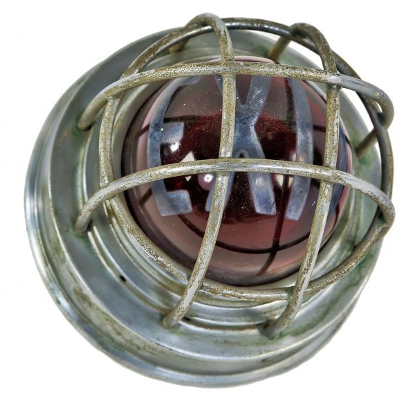all original c. 1930's american depression era fully functional illuminated ruby red glass interior school gymnasium wall-mount exit light fixture with cage 