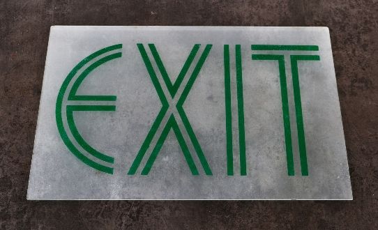 one of two matching "new old stock" c. 1930's antique american art deco style frosted glass single-sided exit sign panel with bold and striking green line lettering