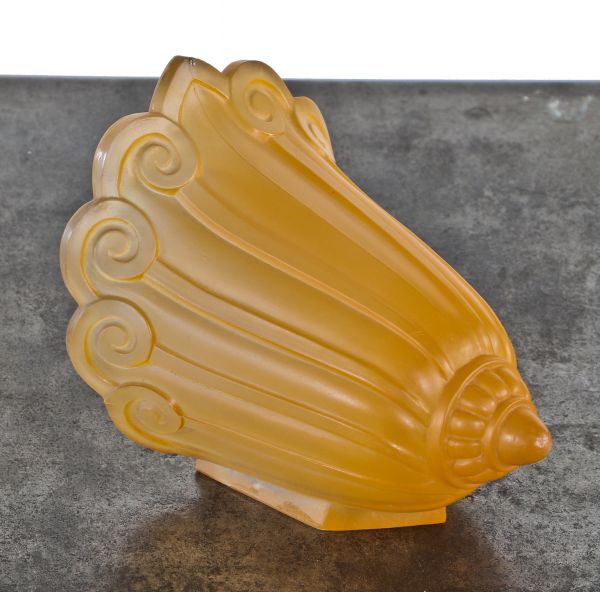 single original and well-maintained salvaged interior art deco style "fleur-de-lis" pattern two-tone orange enameled pressed glass replacement ceiling fixture slip shade