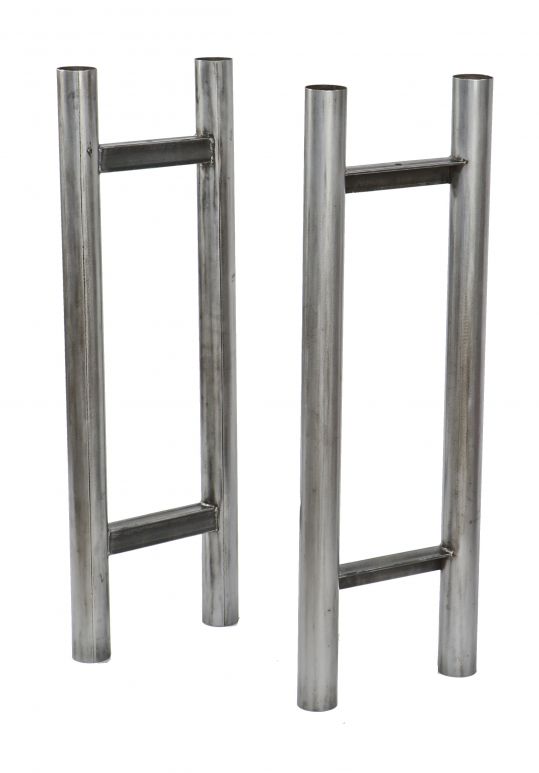 two matching original massive vintage american industrial refinished steel upright tubular steel stands or bases with brushed metal finish sealed with a clear coat lacquer