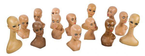 group of several unique vintage american industrial molded plastic and/or fiberglass flesh-toned jewelry and hat mannequin heads or busts salvaged from an old clothing store