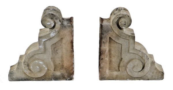 two original matching elegantly designed early 20th century standard brewery corner saloon carved limestone exterior roofline brackets or corbels with age appropriate wear