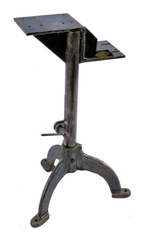 refinished early 20th century antique american industrial three-legged stationary stamped press machine stand or table base with brushed metal finish