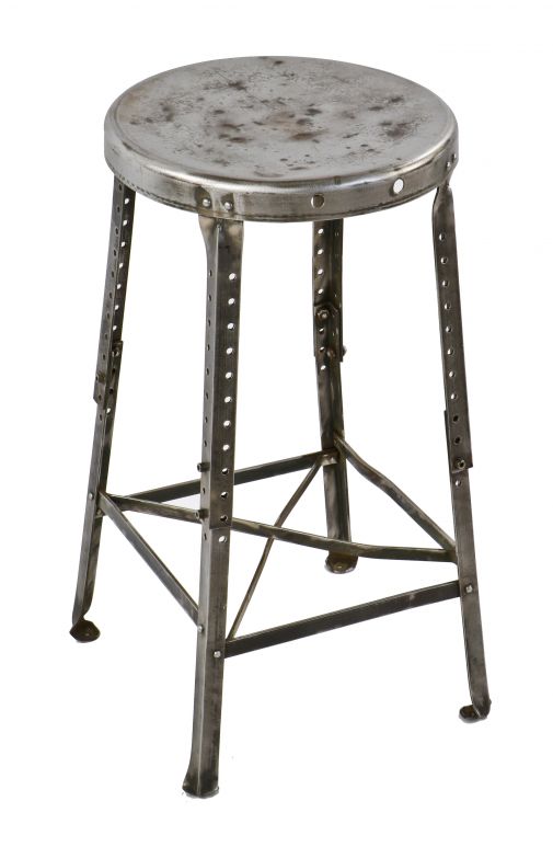 original c. 1920's reinforced antique american industrial heavy gauge cold-rolled steel four-legged adjustable height factory machinist stool with inward turned ball feet