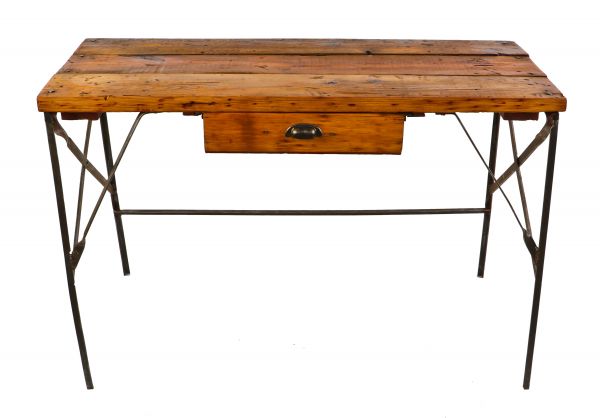 cleaned and refinished late 1920's antique american industrial pressed and folded riveted joint angled steel stationary chicago factory workbench with original old growth pine wood top