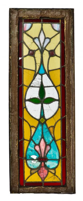 one of two original and largely intact brightly colored american antique long and narrow variegated art glass chicago residential stained glass windows with original wood frame