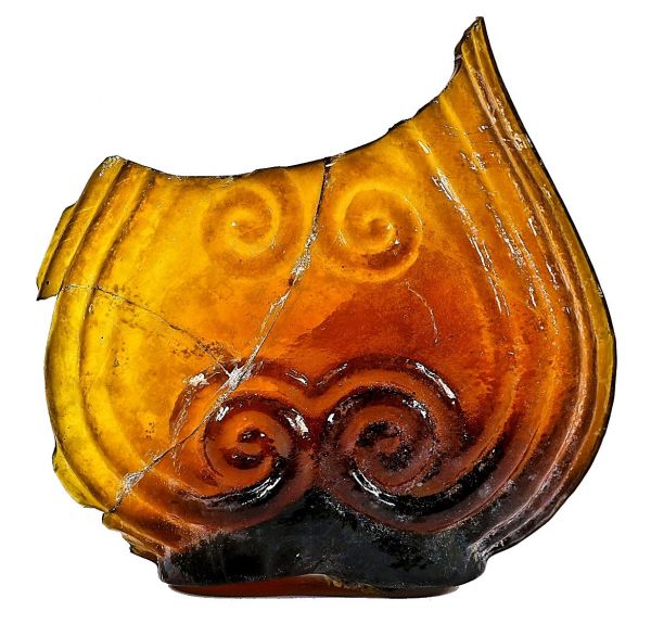 remarkable and richly colored antique american c. mid-1840's large fragment of a decorative glass golden amber scroll flask dug from a downtown chicago privy pit