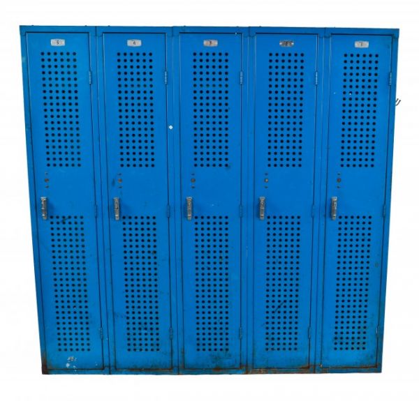 original bank of intact structurally sound vintage american industrial pressed and folded multi-door blue painted salvaged chicago factory lunchroom lockers with distinctive perforations for ventilation