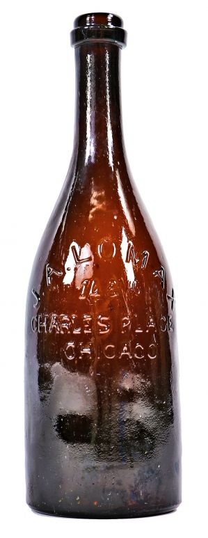 all original and hard to find antique late nineteenth century deep amber glass quart size bottle manufactured for chicago bottling giant john a. lomax