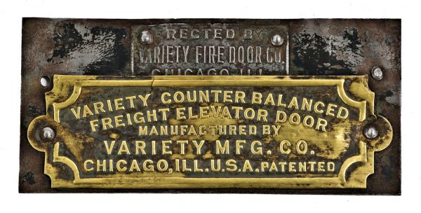 early 20th century antique american single-sided riveted joint variety counter balanced freight elevator door brass plaque salvaged from a fulton market meat processing building