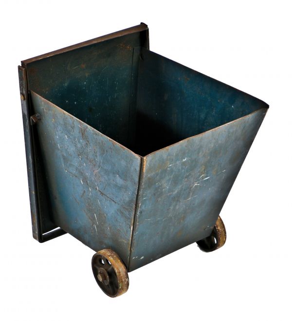 original early 20th century reinforced pressed and folded weathered blue enameled heavy gauge steel mobile factory machine shop storage bin with spoked cast iron wheels