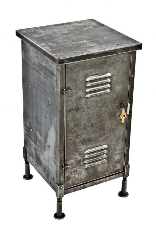 seldom found all original and intact c. 1915-1920 antique american industrial combination pressed steel locker cabinet and side table with louvered door and adjustable feet