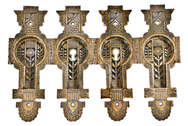 group of exceptional all original c. 1880's antique american eastlake style ornamental cast bronze oversized residential pocket door escutcheons with black enameled inlay