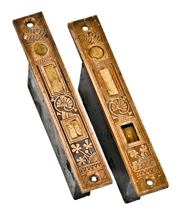 set of matching original and intact early 1880's antique american ornamental cast bronze and brass eastlake style pocket or sliding door mortise locks