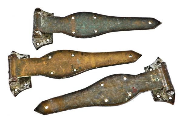 three matching all original late 19th or early 20th century heavy cast bronze gloekler butcher shop cooler door strap hinges with a partially intact nickel-plated finish 