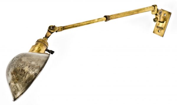 early 20th century fully adjustable and highly desirable tubular brass telescoping o.c. white articulating task lamp with cast brass mountable backplate and hubbell shade