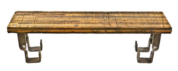 combination railroad oak wood boxcar floor affixed to heavily reinforced twisted wrought iron commercial building joist hangers or brackets repurposed as bench or console