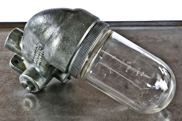 hard to find and highly sought after heavily reinforced c. 1930's-1940's cast steel wall-mount benjamin "vapolet" explosion proof american industrial factory sconce