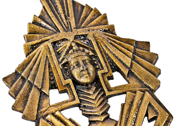 striking single c. 1930's american art deco style ornamental cast iron egyptian revival figural andiron ornament with the original intact gold enameled finish 