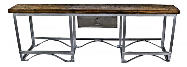 oversized all-welded joint heavy gauge angled steel boilerworks machine shop work table with centrally located single drawer and oak wood tabletop