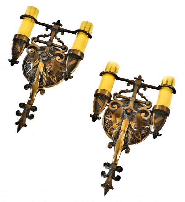 matching pair of original well-maintained spanish revival style ornamental cast brass interior residential double arm wall sconces 