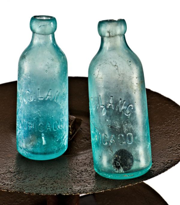 original and completely intact antique 1878-1880's privy dug blue aqua glass hutchinson style soda bottle fabricated for f.c. lang in chicago, il 